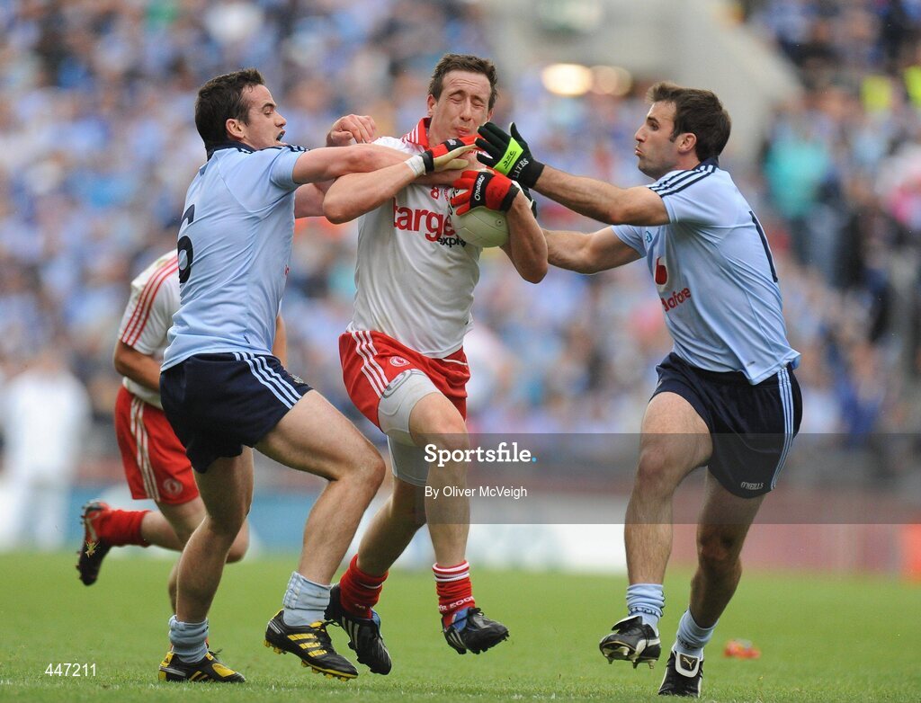 31 July 2010; Colm Cavanagh, Tyrone, in action against Gerard Brennan and Bryan Cullen, Dublin. GAA Football All-Ireland Senior Championship Quarter-Final, Tyrone v Dublin, Croke Park, Dublin. Picture credit: Oliver McVeigh / SPORTSFILE