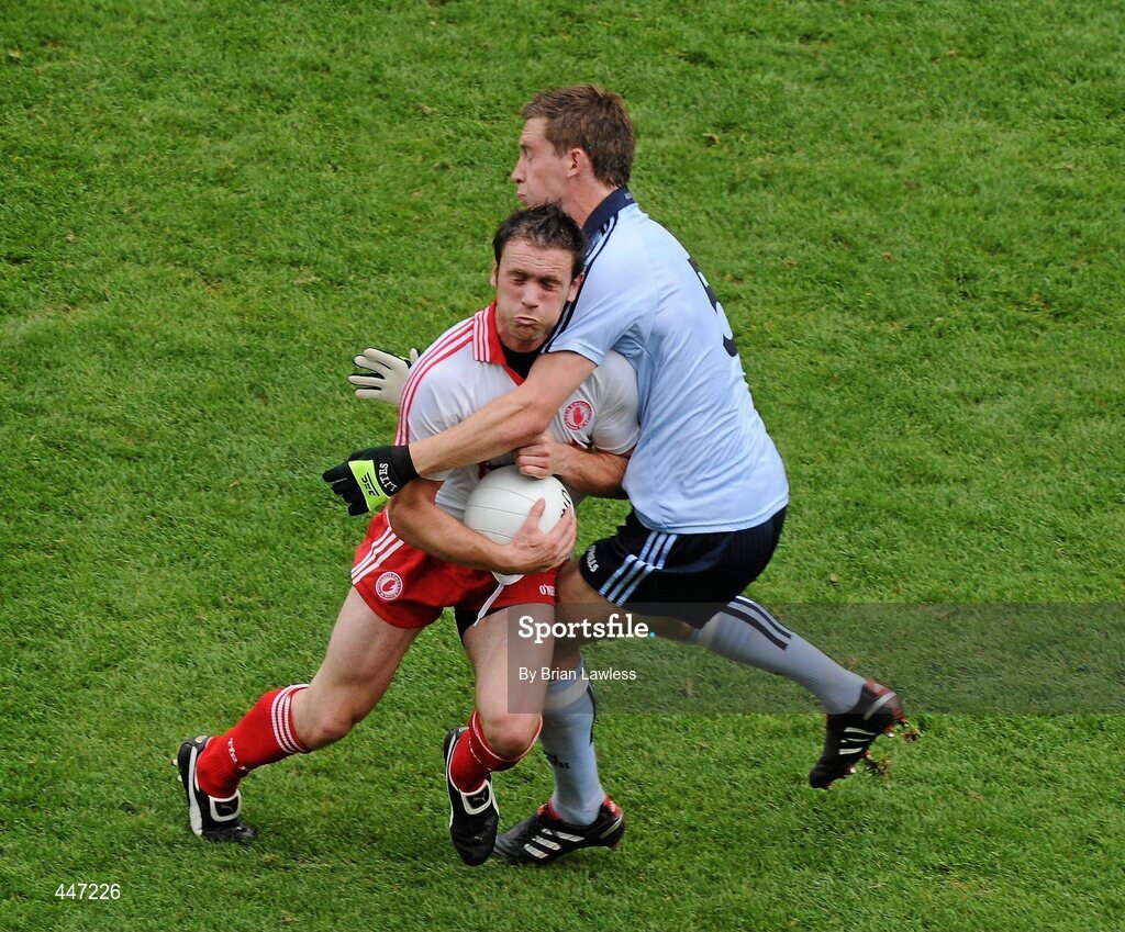 31 July 2010; Martin Penrose, Tyrone, in action against Kevin Nolan, Dublin. GAA Football All-Ireland Senior Championship Quarter-Final, Tyrone v Dublin, Croke Park, Dublin. Picture credit: Brian Lawless / SPORTSFILE
