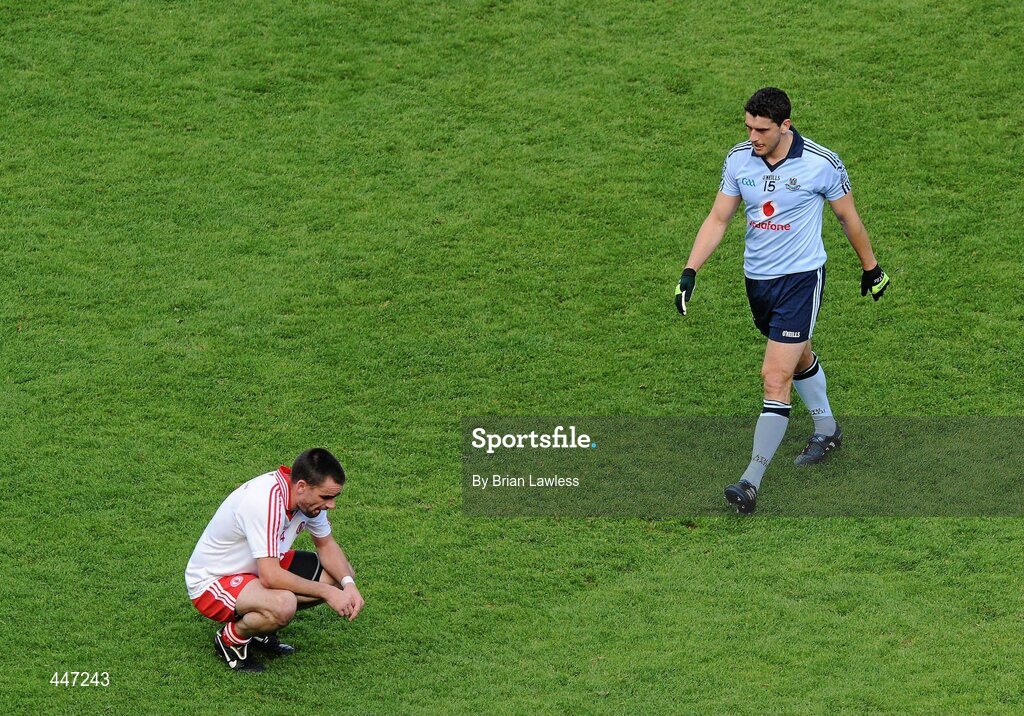 31 July 2010; Dublin's Bernard Brogan makes his way to console Tyrone's Ryan McMenamin after the match. GAA Football All-Ireland Senior Championship Quarter-Final, Tyrone v Dublin, Croke Park, Dublin. Picture credit: Brian Lawless / SPORTSFILE