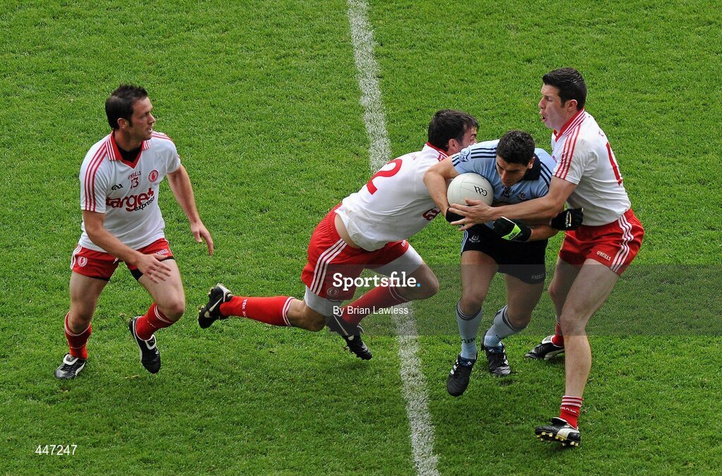 31 July 2010; Bernard Brogan, Dublin, in action against, from left, Martin Penrose, Joe McMahon, and Seán Cavanagh, Tyrone. GAA Football All-Ireland Senior Championship Quarter-Final, Tyrone v Dublin, Croke Park, Dublin. Picture credit: Brian Lawless / SPORTSFILE