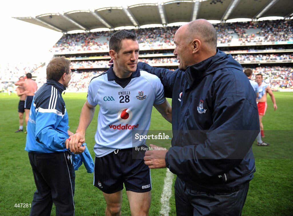 31 July 2010; Denis Bastick is congratulated by Dublin selector David Hickey after the game. GAA Football All-Ireland Senior Championship Quarter-Final, Tyrone v Dublin, Croke Park, Dublin. Picture credit: Ray McManus / SPORTSFILE