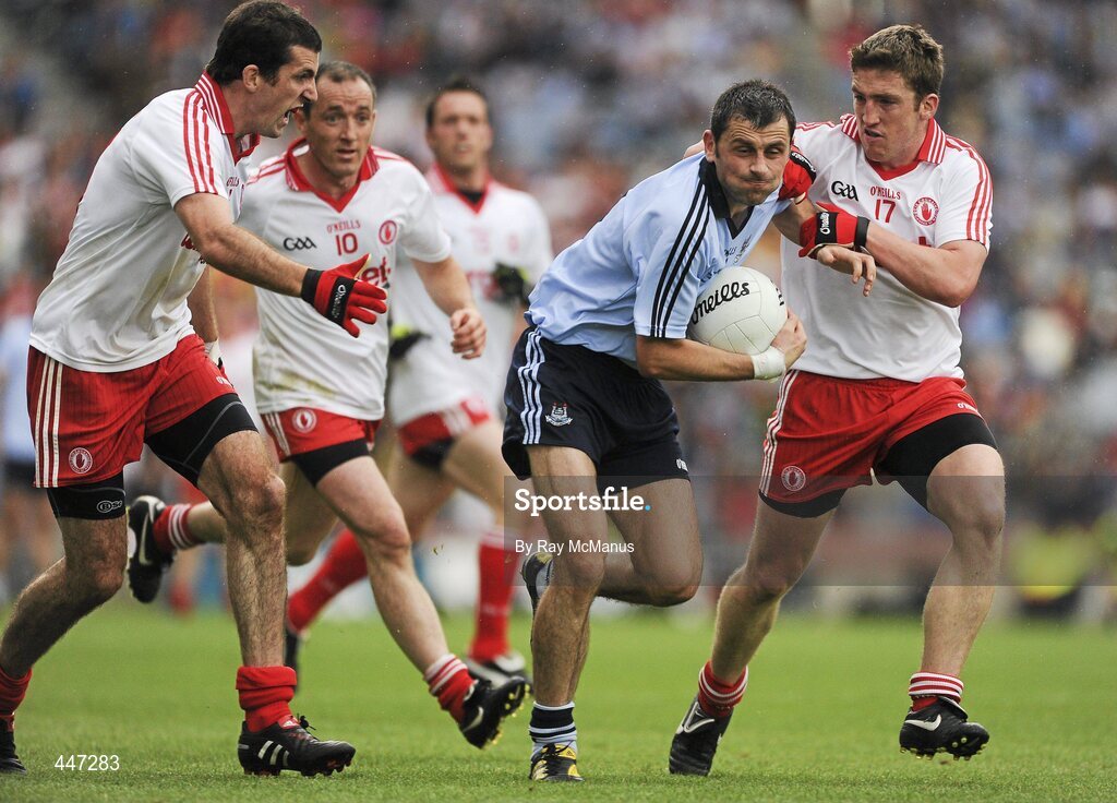 31 July 2010; Alan Brogan, Dublin, in action against Justin McMahon, left, and Dermot Carlin, 17, Tyrone. GAA Football All-Ireland Senior Championship Quarter-Final, Tyrone v Dublin, Croke Park, Dublin. Picture credit: Ray McManus / SPORTSFILE