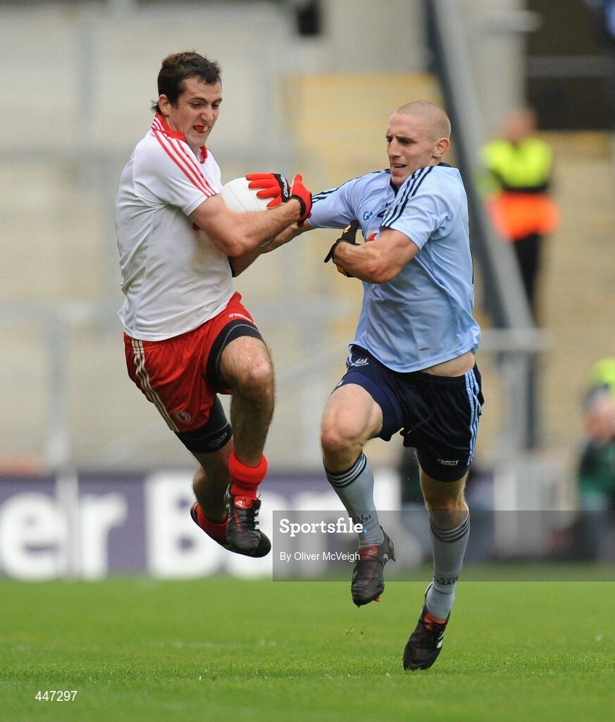 31 July 2010; Justin McMahon, Tyrone, in action against Eoghan O'Gara, Dublin. GAA Football All-Ireland Senior Championship Quarter-Final, Tyrone v Dublin, Croke Park, Dublin. Picture credit: Oliver McVeigh / SPORTSFILE