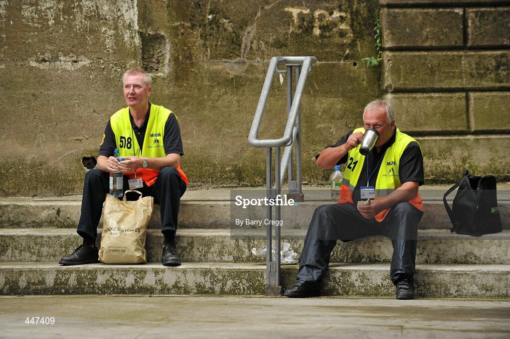 1 August 2010; Two GAA officals take a break before the hard work starts ahead of the Roscommon v Cork game. GAA Football All-Ireland Senior Championship Quarter-Final, Roscommon v Cork, Croke Park, Dublin. Picture credit: Barry Cregg / SPORTSFILE