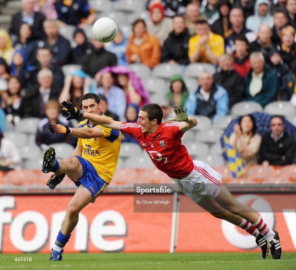 1 August 2010; Ger Heneghan, Roscommon, in action against Ray Carey, Cork. GAA Football All-Ireland Senior Championship Quarter-Final, Roscommon v Cork, Croke Park, Dublin. Picture credit: Oliver McVeigh / SPORTSFILE
