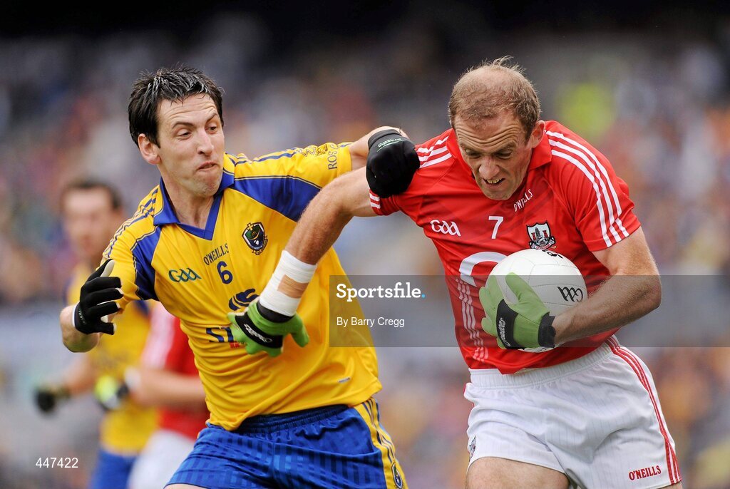 1 August 2010; Paudie Kissane, Cork, in action against Cathal Dineen, Roscommon. GAA Football All-Ireland Senior Championship Quarter-Final, Roscommon v Cork, Croke Park, Dublin. Picture credit: Barry Cregg / SPORTSFILE