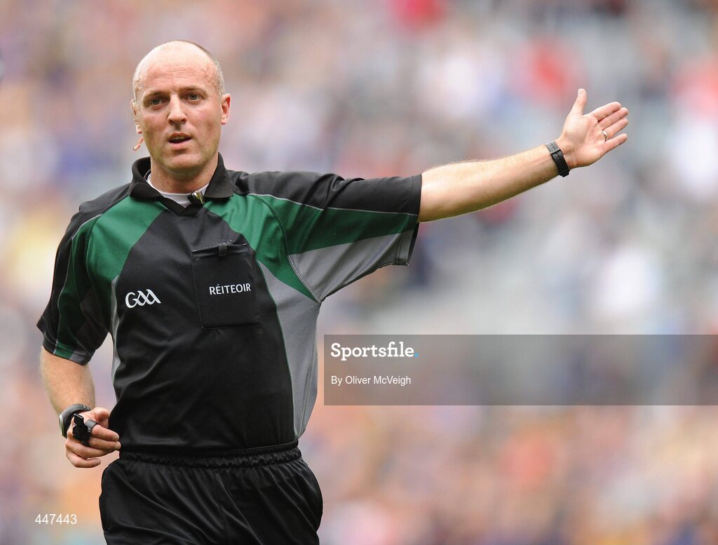 1 August 2010; Referee Cormac Reilly gives a free. GAA Football All-Ireland Senior Championship Quarter-Final, Roscommon v Cork, Croke Park, Dublin. Picture credit: Oliver McVeigh / SPORTSFILE
