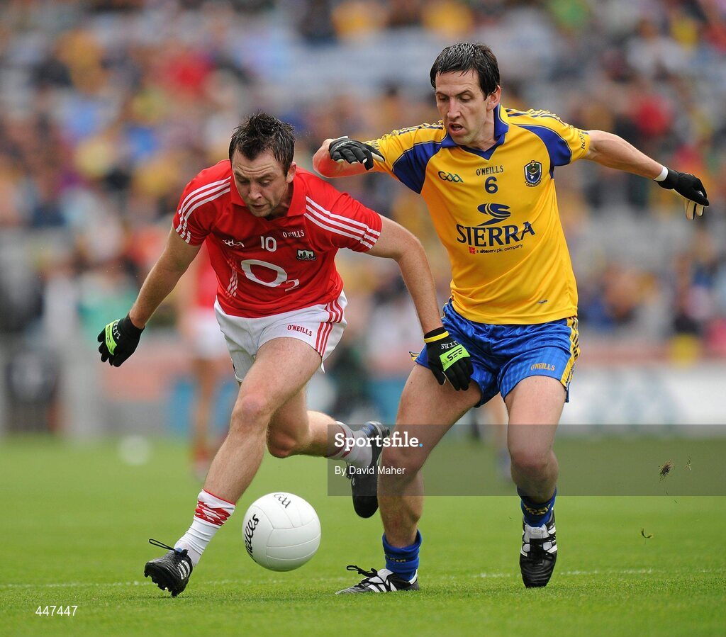 1 August 2010; Paul Kerrigan, Cork, in action against Cathal Dineen, Roscommon. GAA Football All-Ireland Senior Championship Quarter-Final, Roscommon v Cork, Croke Park, Dublin. Picture credit: David Maher / SPORTSFILE