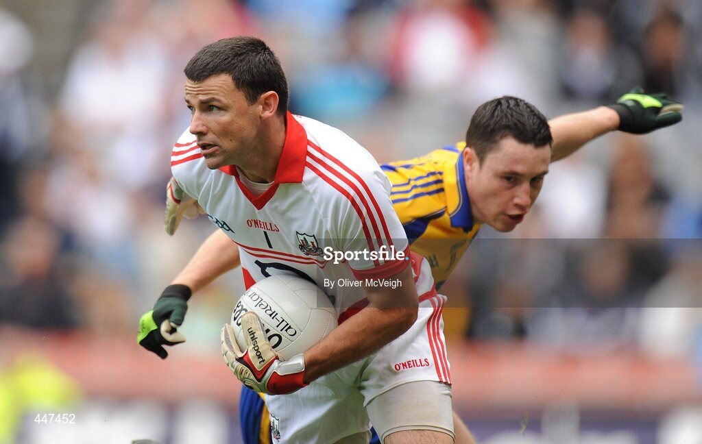 1 August 2010; Alan Quirke, Cork, in action against David O'Gara, Roscommon. GAA Football All-Ireland Senior Championship Quarter-Final, Roscommon v Cork, Croke Park, Dublin. Picture credit: Oliver McVeigh / SPORTSFILE