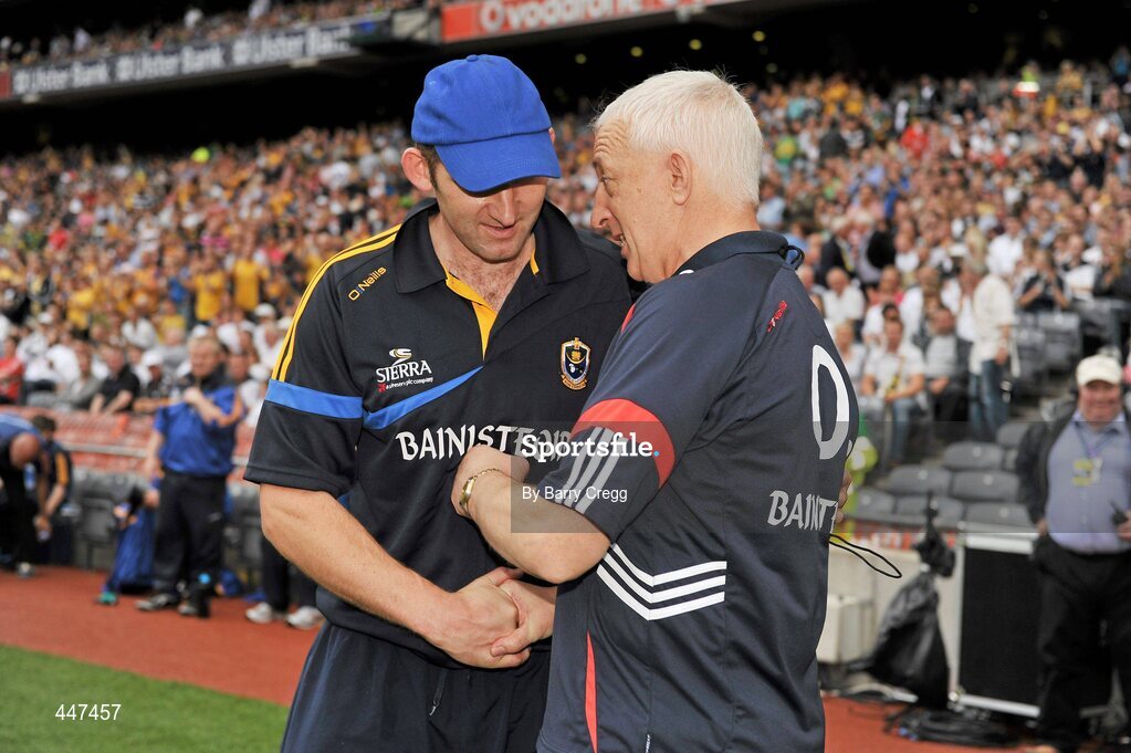 1 August 2010; Cork manager Conor Counihan, right, shakes hands with Roscommon manager Fergal O' Donnell at the end of the game. GAA Football All-Ireland Senior Championship Quarter-Final, Roscommon v Cork, Croke Park, Dublin. Picture credit: Barry Cregg / SPORTSFILE