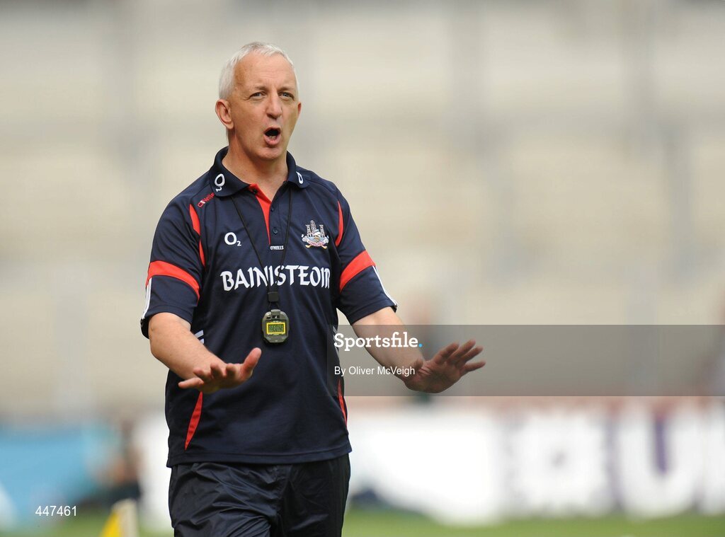 1 August 2010; Cork manager Conor Counihan trying to calm his players down. GAA Football All-Ireland Senior Championship Quarter-Final, Roscommon v Cork, Croke Park, Dublin. Picture credit: Oliver McVeigh / SPORTSFILE