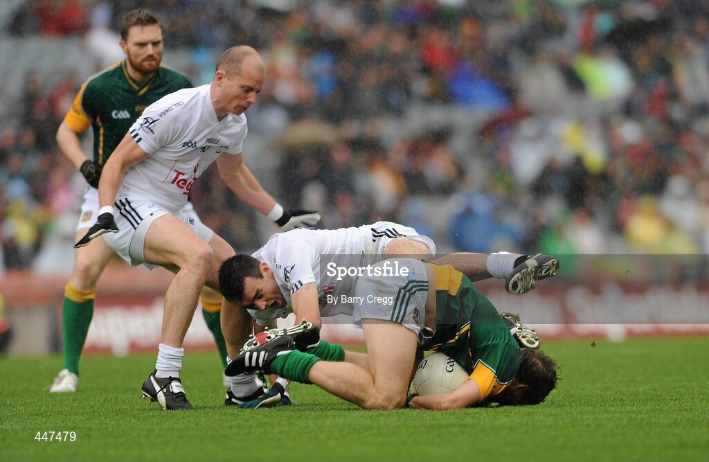 1 August 2010; Brian Meade, Meath, collides with John Doyle and James Kavanagh, left, Kildare. GAA Football All-Ireland Senior Championship Quarter-Final, Meath v Kildare, Croke Park, Dublin. Picture credit: Barry Cregg / SPORTSFILE