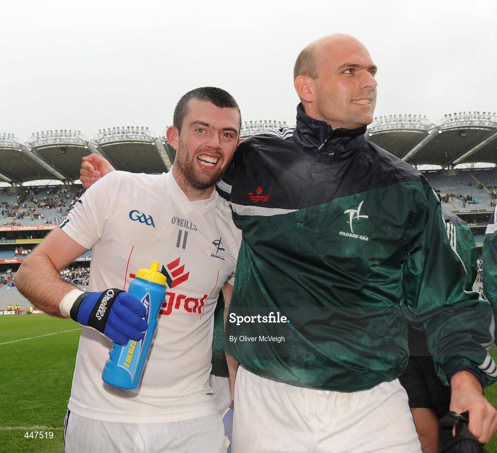1 August 2010; Padraig O'Neill, Kildare, celebrates with Paul Flood after the game. GAA Football All-Ireland Senior Championship Quarter-Final, Meath v Kildare, Croke Park, Dublin. Picture credit: Oliver McVeigh / SPORTSFILE