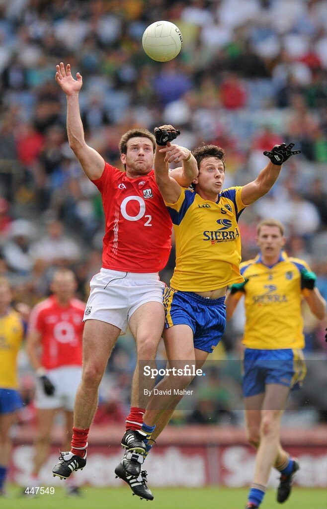 1 August 2010; Karol Mannion, Roscommon, in action against Derek Kavanagh, Cork. GAA Football All-Ireland Senior Championship Quarter-Final, Roscommon v Cork, Croke Park, Dublin. Picture credit: David Maher / SPORTSFILE