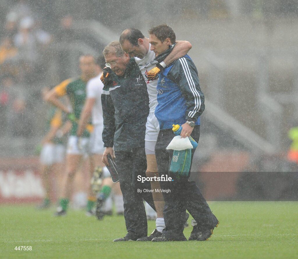 1 August 2010; Dermot Earley, Kildare, is helped off the pitch after being forced to go off injured in the early minutes of the game. GAA Football All-Ireland Senior Championship Quarter-Final, Meath v Kildare, Croke Park, Dublin. Picture credit: Oliver McVeigh / SPORTSFILE