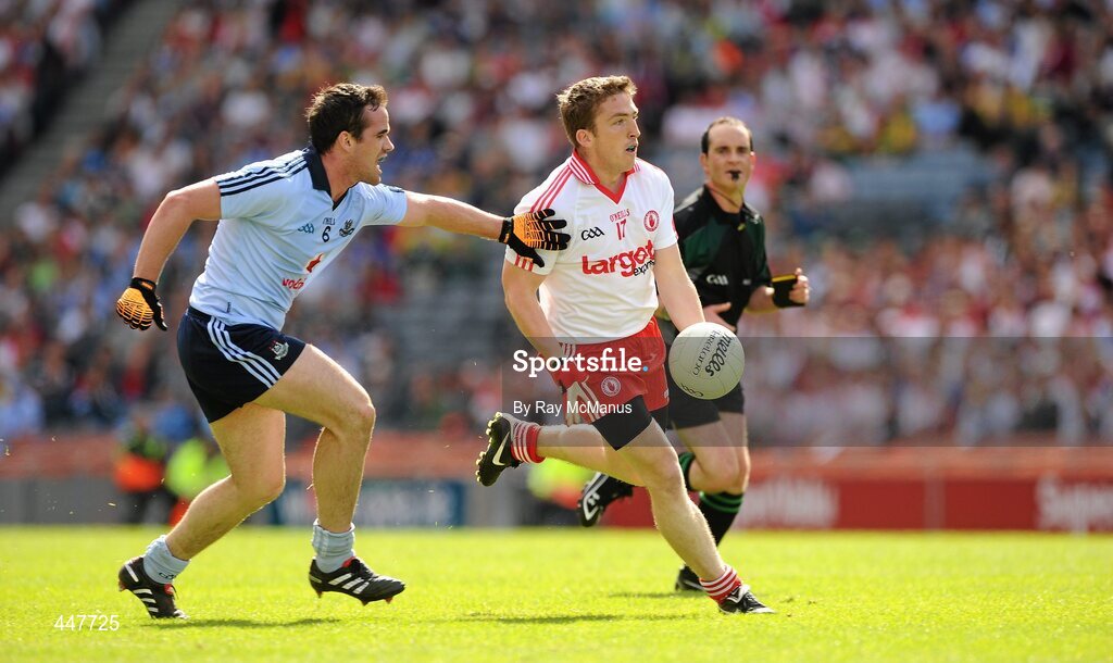 31 July 2010; Dermot Carlin, Tyrone, in action against Gerard Brennan, Dublin. GAA Football All-Ireland Senior Championship Quarter-Final, Tyrone v Dublin, Croke Park, Dublin. Picture credit: Ray McManus / SPORTSFILE