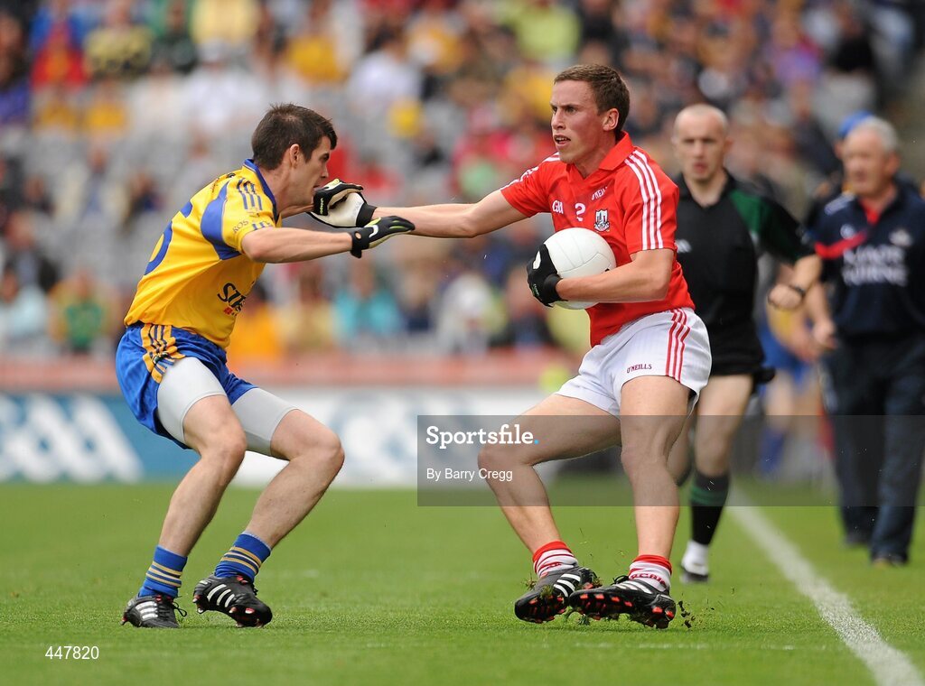 1 August 2010; Patrick Kelly, Cork, in action against Sean Purcell, Roscommon. GAA Football All-Ireland Senior Championship Quarter-Final, Roscommon v Cork, Croke Park, Dublin. Picture credit: Barry Cregg / SPORTSFILE