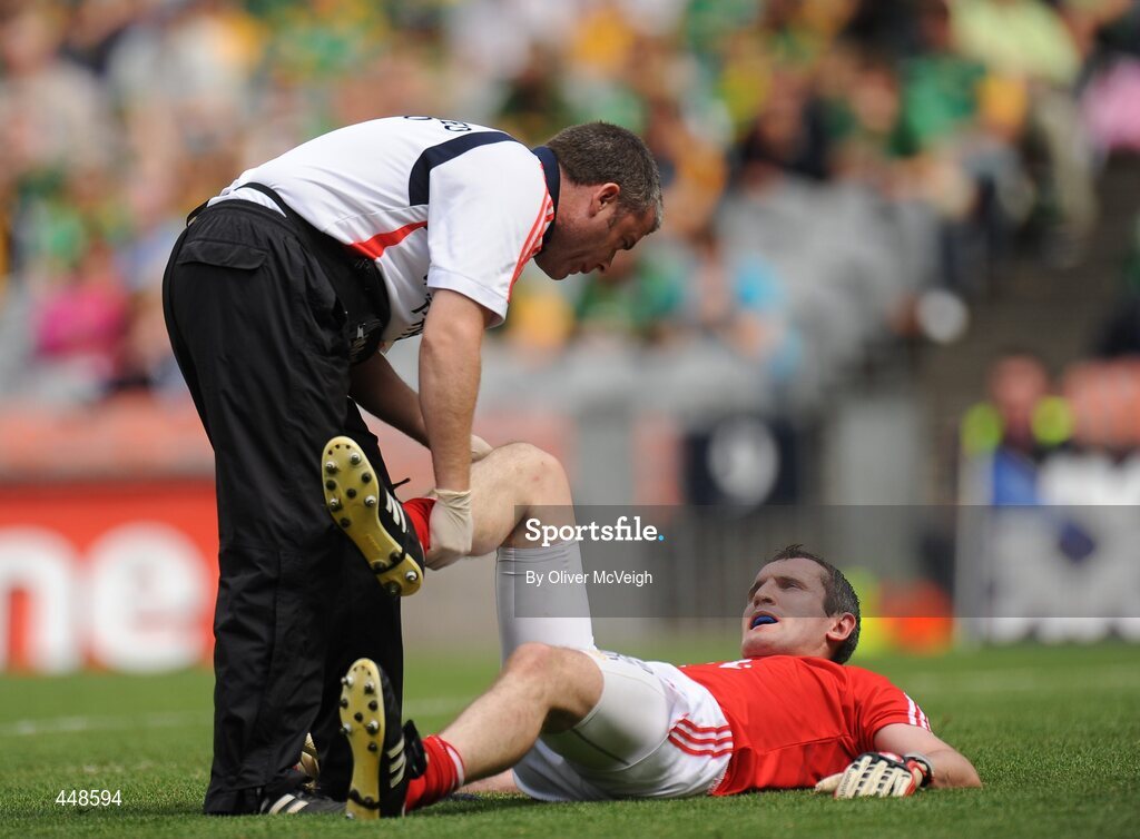 1 August 2010; Cork captain Graham Canty receives treatment for a second half injury from team physiotherapist Declan O'Sullivan. GAA Football All-Ireland Senior Championship Quarter-Final, Roscommon v Cork, Croke Park, Dublin. Picture credit: Oliver McVeigh / SPORTSFILE