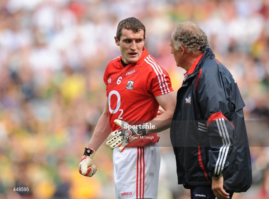 1 August 2010; Cork captain Graham Canty consults team doctor Con Murphy before leaving the field of play. GAA Football All-Ireland Senior Championship Quarter-Final, Roscommon v Cork, Croke Park, Dublin. Picture credit: Oliver McVeigh / SPORTSFILE