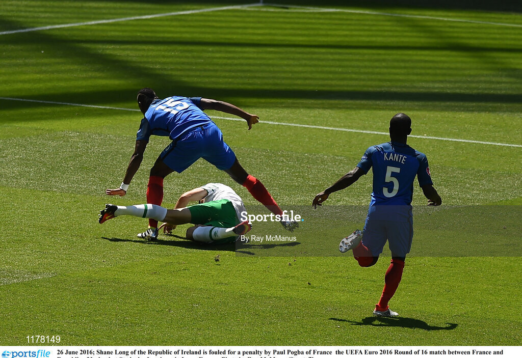 26 June 2016; Shane Long of the Republic of Ireland is fouled for a penalty by Paul Pogba of France  the UEFA Euro 2016 Round of 16 match between France and Republic of Ireland at Stade des Lumieres in Lyon, France. Photo by Ray McManus/Sportsfile