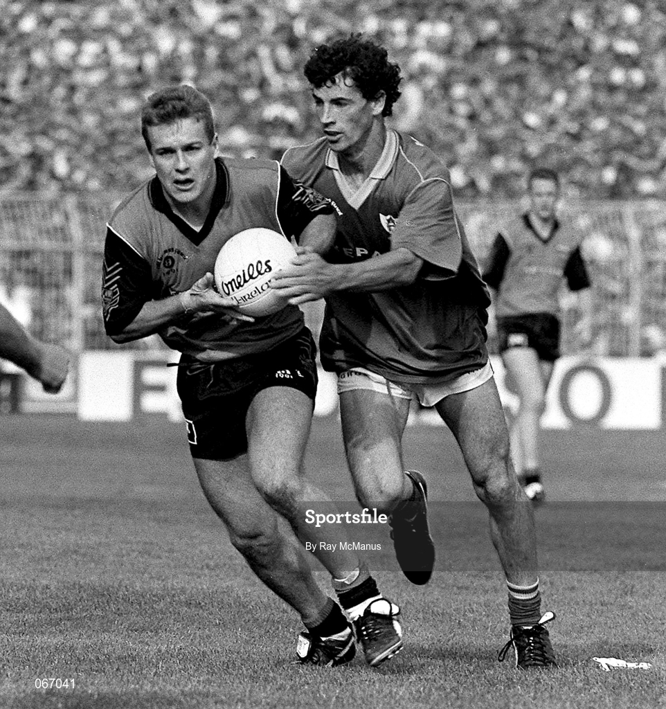 15 September 1991; Kevin Foley of Meath in action against James McCartan of Down during the All-Ireland Senior Football Championship Final match between Down and Meath at Croke Park in Dublin. Photo by Ray McManus/Sportsfile