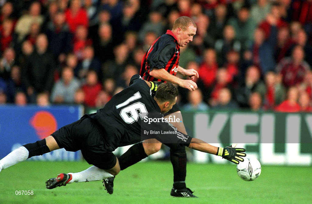 11 July 2001; Glen Crowe of Bohemians takes the ball around FC Levadia Maardu goalkeeper Ernest Martinsons during the UEFA Champions League First Qualifying Round First Leg match between Bohemians and FC Levadia Maardu at Dalymount Park in Dublin. Photo by Brian Lawless/Sportsfile