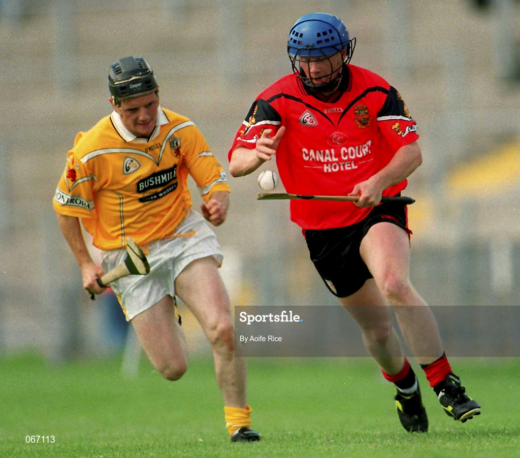 1 July 2001; Aidan Delargey of Down in action against Gerard Adair of Antrim during the Guinness Ulster Senior Hurling Championship Semi-Final match between Antrim and Down at Casement Park in Belfast. Photo by Aoife Rice/Sportsfile