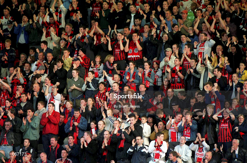 11 July 2001; Bohemian supporters cheer their team during the game during the UEFA Champions League First Qualifying Round First Leg match between Bohemians and FC Levadia Maardu at Dalymount Park in Dublin. Photo by Brian Lawless/Sportsfile