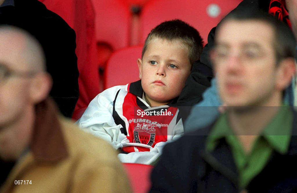 11 July 2001; A young Bohemians fan looks on during the UEFA Champions League First Qualifying Round First Leg match between Bohemians and FC Levadia Maardu at Dalymount Park in Dublin. Photo by Brian Lawless/Sportsfile