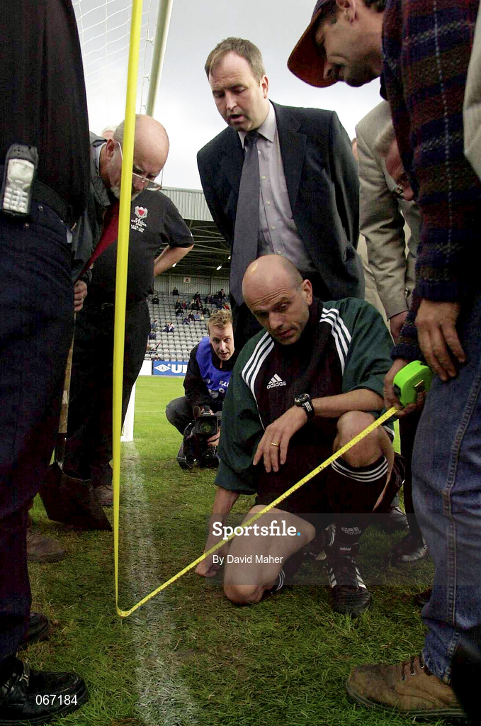 11 July 2001; Bohemians FC club secretary Gerry Cuffe watches over fourth official Carol Bertolone as they check the height between the goal line and the crossbar prior to the UEFA Champions League First Qualifying Round First Leg match between Bohemians and FC Levadia Maardu at Dalymount Park in Dublin. Photo by David Maher/Sportsfile