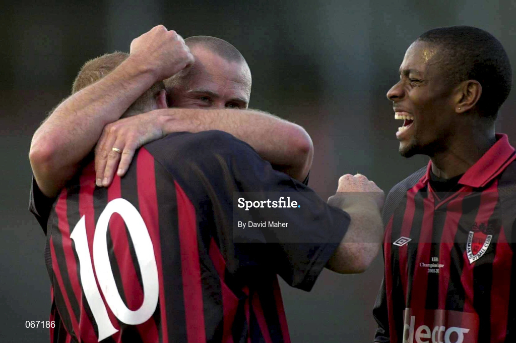 11 July 2001; Glen Crowe, left, of Bohemians, is congratulated by team-mates Paul Byrne and Avery John, right, after scoring their side's third goal during the UEFA Champions League First Qualifying Round First Leg match between Bohemians and FC Levadia Maardu at Dalymount Park in Dublin. Photo by David Maher/Sportsfile