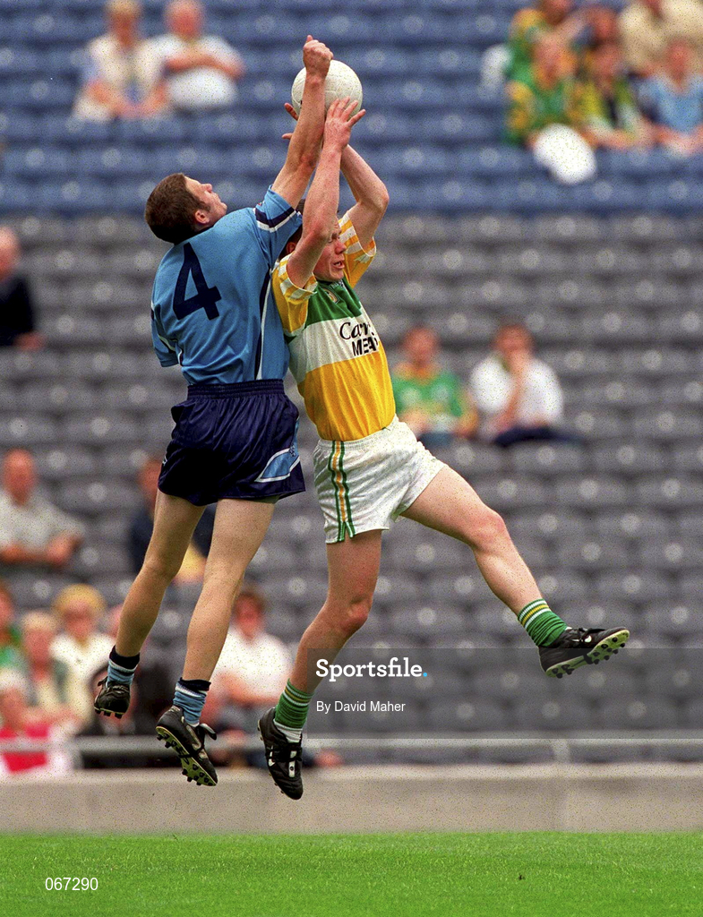 15 July 2001; Michael Hoey of Offaly in action against David Galvin of Dublin during the Leinster Minor Football Championship Final match between Dublin and Offaly in Croke Park, Dublin. Photo by David Maher/Sportsfile
