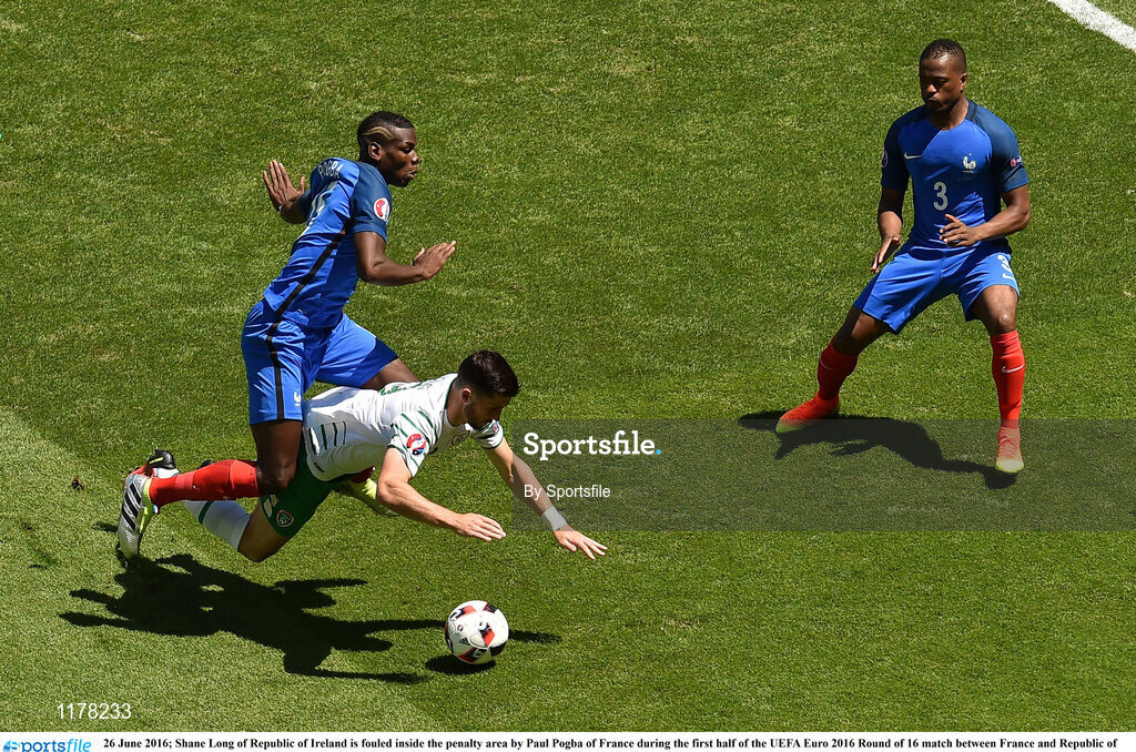 26 June 2016; Shane Long of Republic of Ireland is fouled inside the penalty area by Paul Pogba of France during the first half of the UEFA Euro 2016 Round of 16 match between France and Republic of Ireland at Stade des Lumieres in Lyon, France. Photo by Sportsfile