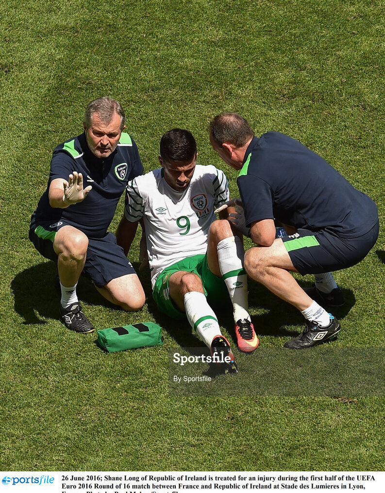 26 June 2016; Shane Long of Republic of Ireland is treated for an injury during the first half of the UEFA Euro 2016 Round of 16 match between France and Republic of Ireland at Stade des Lumieres in Lyon, France. Photo by Sportsfile