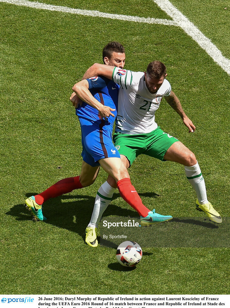 26 June 2016; Daryl Murphy of Republic of Ireland in action against Laurent Koscielny of France during the UEFA Euro 2016 Round of 16 match between France and Republic of Ireland at Stade des Lumieres in Lyon, France. Photo by Sportsfile