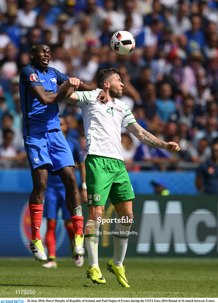 26 June 2016; Daryl Murphy of Republic of Ireland and Paul Pogba of France during the UEFA Euro 2016 Round of 16 match between France and Republic of Ireland at Stade des Lumieres in Lyon, France. Photo by Stephen McCarthy/Sportsfile