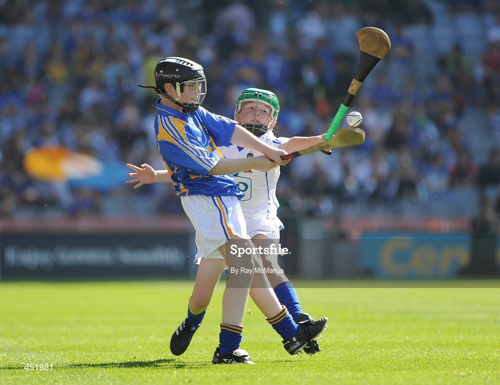 15 August 2010; Brendan Gillespie, Creevy N.S., Ballyshannon, Co. Donegal, representing Tipperary, in action against Jack Murphy, Clarecastle N.S., Co. Clare, representing Waterford. GAA INTO Mini-Sevens during half time of the GAA Hurling All-Ireland Senior Championship Semi-Final, Waterford v Tipperary, Croke Park, Dublin. Picture credit: Ray McManus / SPORTSFILE