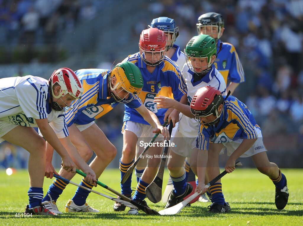 15 August 2010; Conor O’Brien, Watergrasshill N.S., Co. Cork, left and Eoin Coulter, St. Patrick’s, Ballygalget, Co. Down, representing Waterford, in action against David Quilter, Lixnaw B.N.S., Co. Kerry, left, Patrick Garvey, St. Malachy’s P.S., Camlough, Co. Armagh, and Oisín Grant, Gaelscoil Bhun Cranncha, Co. Donegal, representing Tipperary. GAA INTO Mini-Sevens during half time of the GAA Hurling All-Ireland Senior Championship Semi-Final, Waterford v Tipperary, Croke Park, Dublin. Picture credit: Ray McManus / SPORTSFILE
