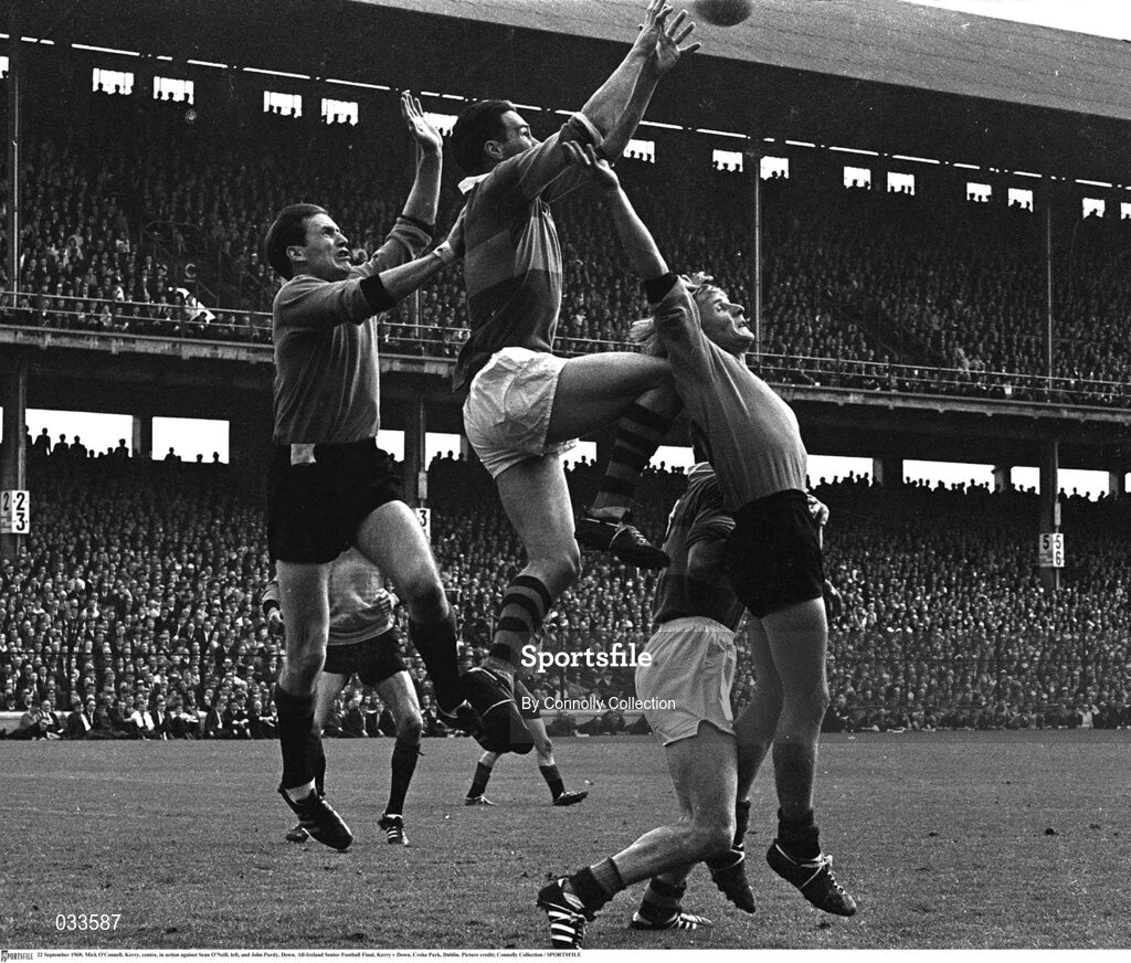 22 September 1968; Mick O'Connell of Kerry, centre, in action against Sean O'Neill, left, and John Purdy of Down during the All-Ireland Senior Football Final match between Kerry and Down at Croke Park in Dublin. Photo by Connolly Collection/Sportsfile