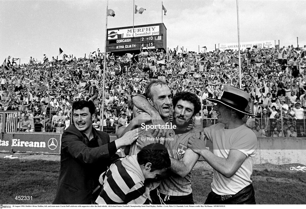 28 August 1983; Dublin's Brian Mullins, left, and team-mate Ciarán Duff celebrate with supporters after the final whistle. All-Ireland Senior Football Championship Semi-Final Replay, Dublin v Cork, Páirc Uí Chaoimh, Cork. Picture credit: Ray McManus / SPORTSFILE