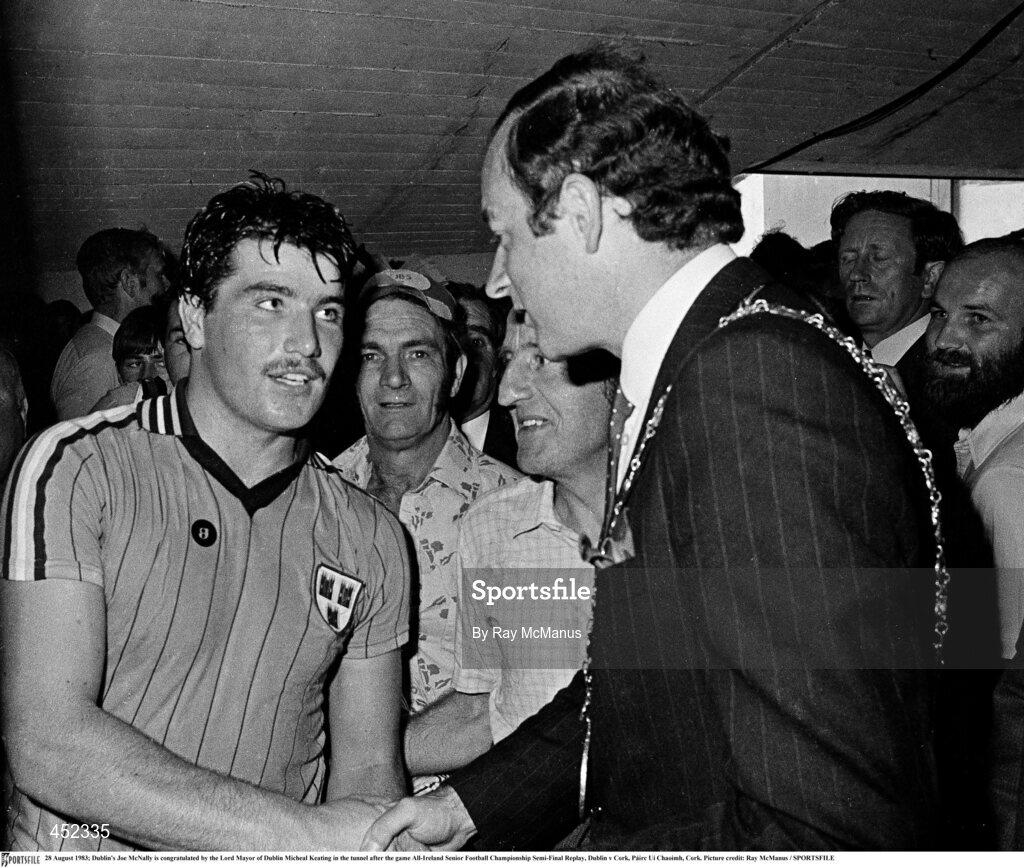 28 August 1983; Dublin's Joe McNally is congratulated by the Lord Mayor of Dublin Micheal Keating in the tunnel after the game All-Ireland Senior Football Championship Semi-Final Replay, Dublin v Cork, Páirc Uí Chaoimh, Cork. Picture credit: Ray McManus / SPORTSFILE