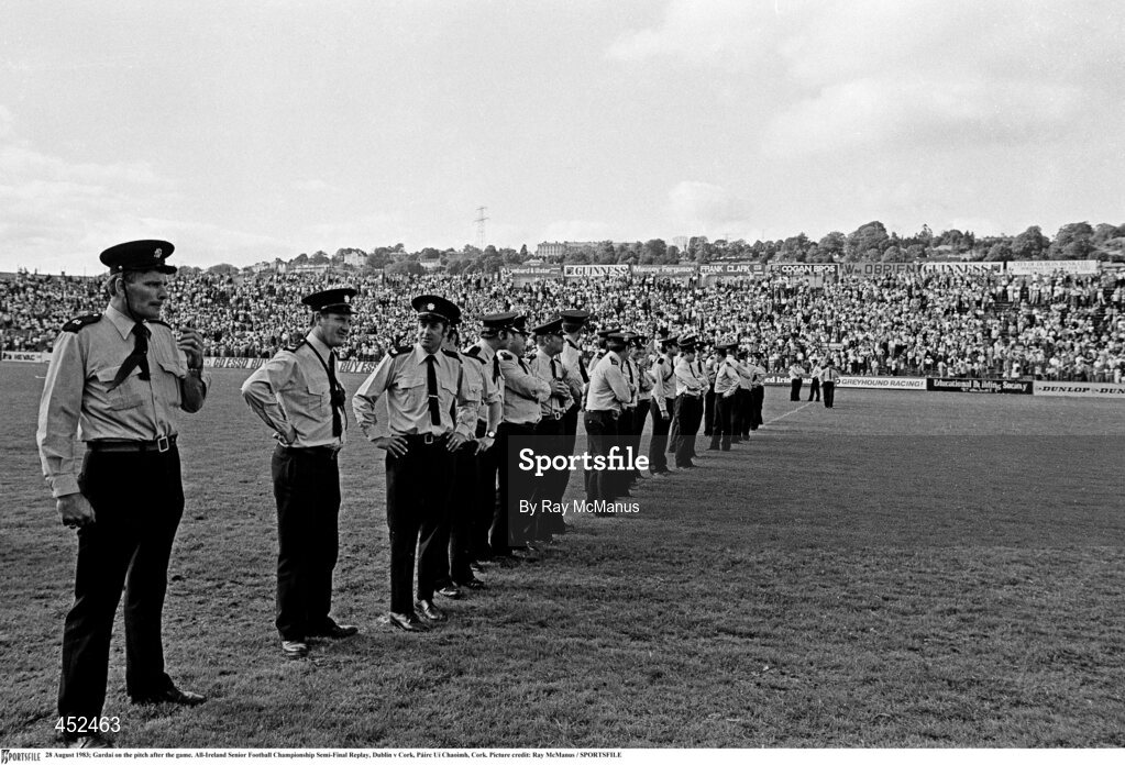 28 August 1983; Gardaí on the pitch after the All-Ireland Senior Football Championship Semi-Final Replay match between Dublin and Cork at Páirc Uí Chaoimh, Cork. Photo by Ray McManus/Sportsfile