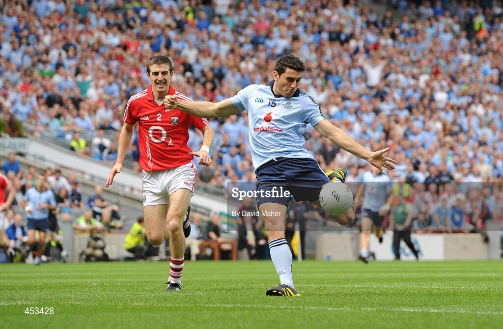 22 August 2010; Bernard Brogan, Dublin, beats Ray Carey, Cork, to score his sides first goal. GAA Football All-Ireland Senior Championship Semi-Final, Dublin v Cork, Croke Park, Dublin. Picture credit: David Maher / SPORTSFILE