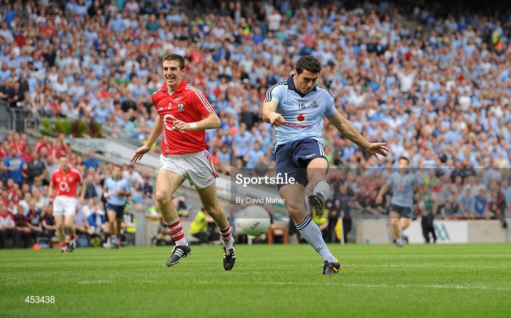22 August 2010; Bernard Brogan, Dublin, beats Ray Carey, Cork, to score his side's first goal. GAA Football All-Ireland Senior Championship Semi-Final, Dublin v Cork, Croke Park, Dublin. Picture credit: David Maher / SPORTSFILE