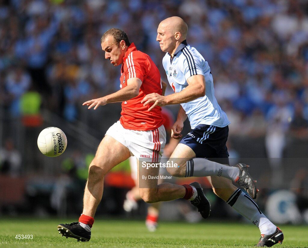 22 August 2010; John Miskella, Cork, in action against Eoghan O'Gara, Dublin. GAA Football All-Ireland Senior Championship Semi-Final, Dublin v Cork, Croke Park, Dublin. Picture credit: David Maher / SPORTSFILE