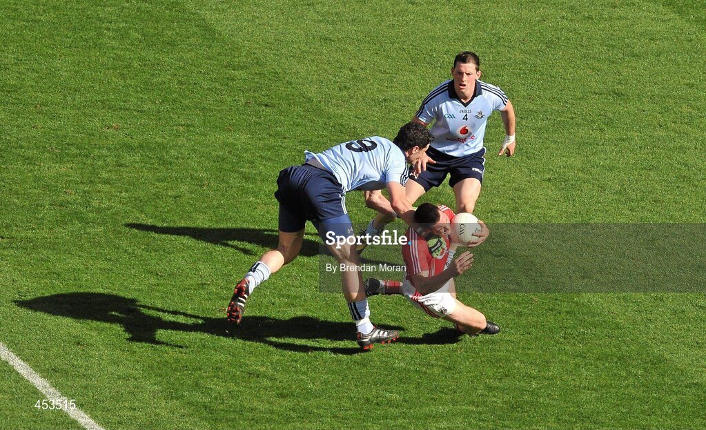 22 August 2010; Dublin's Ross McConnell tackles Cork's Noel O'Leary which resulted in McConnell receiving a second yellow card and subsequently a red card. GAA Football All-Ireland Senior Championship Semi-Final, Dublin v Cork, Croke Park, Dublin. Picture credit: Brendan Moran / SPORTSFILE