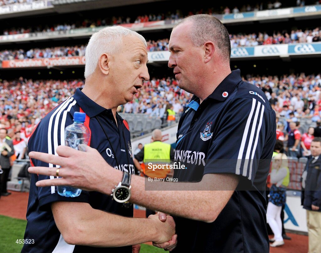 22 August 2010; Cork manager Conor Counihan, left, shakes hands with Dublin manager Pat Gilroy at the end of the game. GAA Football All-Ireland Senior Championship Semi-Final, Dublin v Cork, Croke Park, Dublin. Picture credit:  Barry Cregg / SPORTSFILE