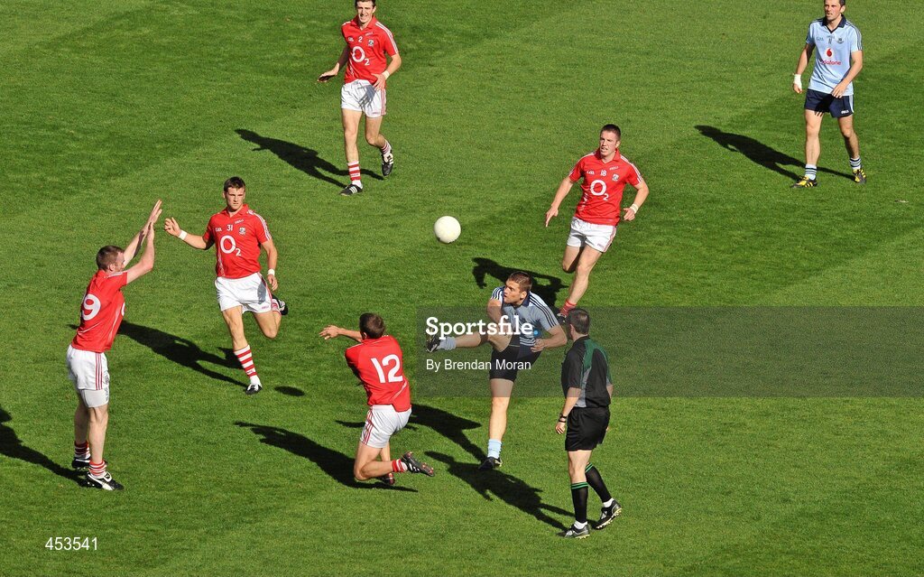 22 August 2010; Dublin's Conal Keaney has his shot blocked by Patrick Kelly, 12, Cork, late in the game. GAA Football All-Ireland Senior Championship Semi-Final, Dublin v Cork, Croke Park, Dublin. Picture credit: Brendan Moran / SPORTSFILE