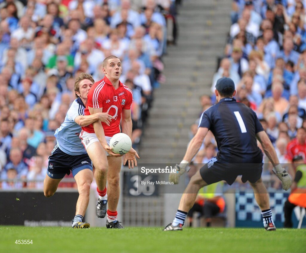 22 August 2010; Daniel Goulding beats Dublin goalkeeper Stephen Cluxton and Michale Fitzsimons to score a goal for Cork only to have it disallowed by the referee. GAA Football All-Ireland Senior Championship Semi-Final, Dublin v Cork, Croke Park, Dublin. Picture credit: Ray McManus / SPORTSFILE