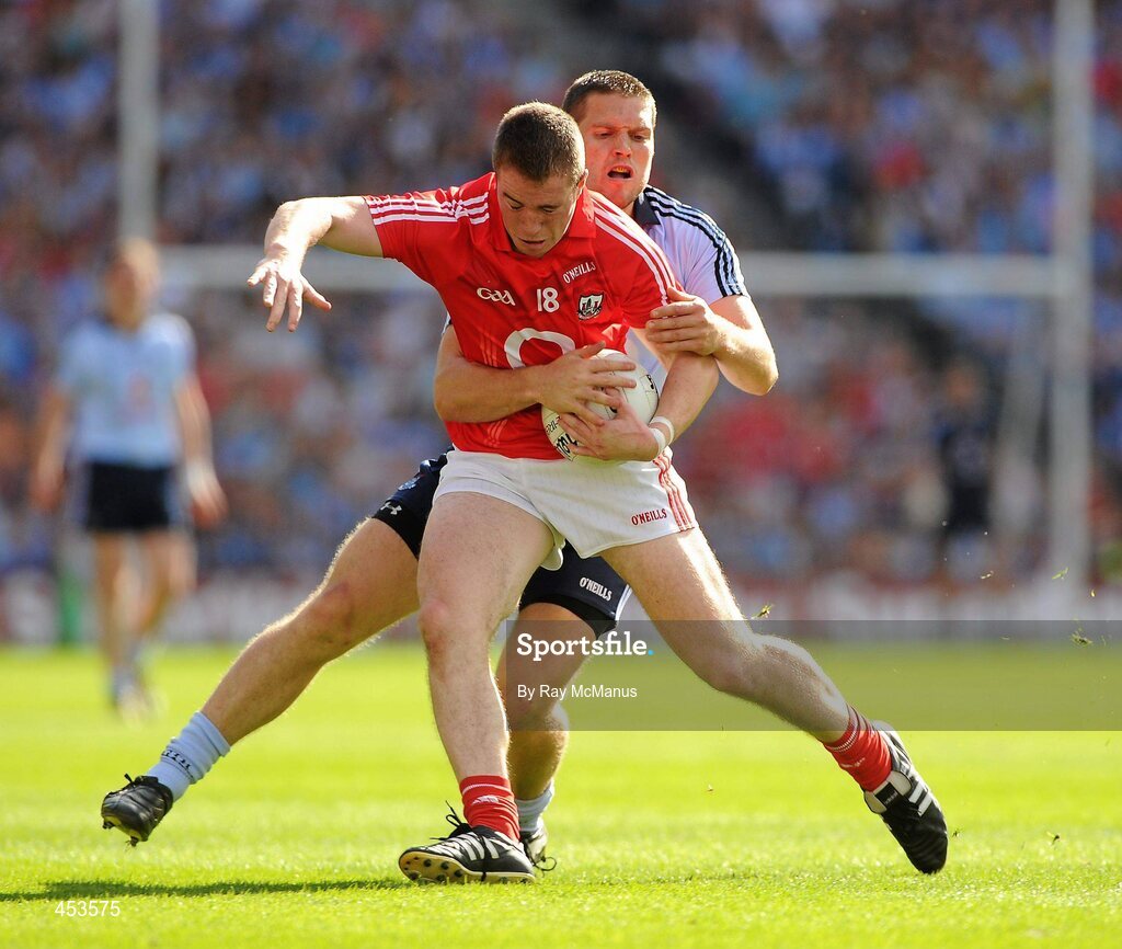 22 August 2010; Colm O'Neill, Cork, is tackled by Conal Keaney,  Dublin. GAA Football All-Ireland Senior Championship Semi-Final, Dublin v Cork, Croke Park, Dublin. Picture credit: Ray McManus / SPORTSFILE